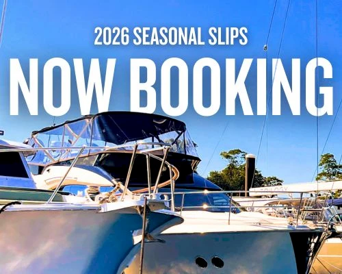 Boats docked in a marina with blue sky; &ldquo;NOW BOOKING&rdquo; text on the cover, 2026 seasonal slips.