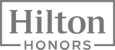 The image displays the Hilton Honors logo, featuring the words 